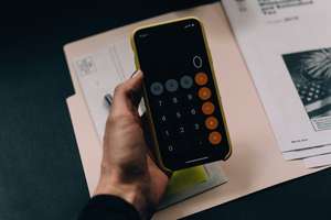 Calculator in hand